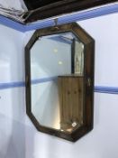 An oak framed mirror