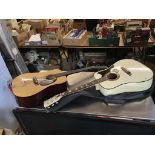 A Yasum W250 acoustic guitar and another guitar