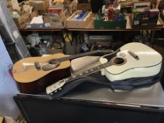 A Yasum W250 acoustic guitar and another guitar