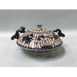 A shallow circular Chinese blue and white lidded two handled bowl, decorated with fish, 33cm