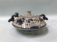 A shallow circular Chinese blue and white lidded two handled bowl, decorated with fish, 33cm