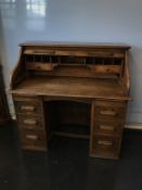 A Tambour oak desk