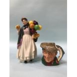 A Royal Doulton 'Biddy Penny Farthing' and a character jug