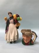 A Royal Doulton 'Biddy Penny Farthing' and a character jug