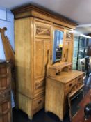 A Victorian two piece bedroom suite, comprising wardrobe and dressing chest