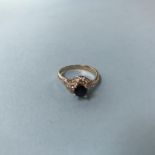 A 14ct gold sapphire and diamond ring