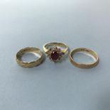 Three 18ct gold rings, 7.7g