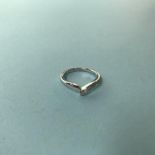 A 9ct white gold quarter diamond wishbone ring