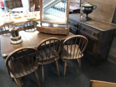 An Ercol eight piece dining room suite