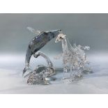 A Swarovski Giraffe, 'The Pegasus' and 'Paikea Whale' (boxed)