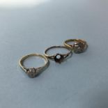 Two 18ct gold rings, 4g and one other