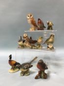 A collection of eleven various Beswick birds