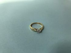 An 18ct gold diamond solitaire ring, 0.25ct