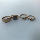 Four 9ct gold rings, 9.7g