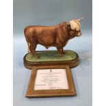 A Royal Worcester model of a 'Highland Bull' by Doris Lindner, number 279/500