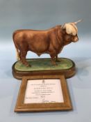 A Royal Worcester model of a 'Highland Bull' by Doris Lindner, number 279/500