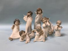 Eight Lladro 'Winged Angel' figures