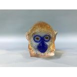 A Swedish Maleras coloured glass bust of a monkeys head, number 34/70, 10cm height