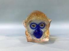 A Swedish Maleras coloured glass bust of a monkeys head, number 34/70, 10cm height