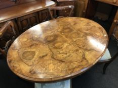 A Victorian walnut tilt top breakfast table