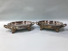A pair of plated food servers