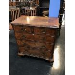 A good quality reproduction walnut chest of drawers