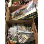 Two boxes of model railway