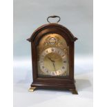 A Garrard mahogany mantle clock, 16cm x 27cm approx.