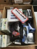 A quantity of Die cast vehicles in one box