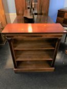 A reproduction mahogany open bookcase, 84cm width