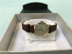 A ladies 9ct gold Omega watch