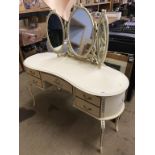 A cream dressing table