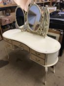 A cream dressing table