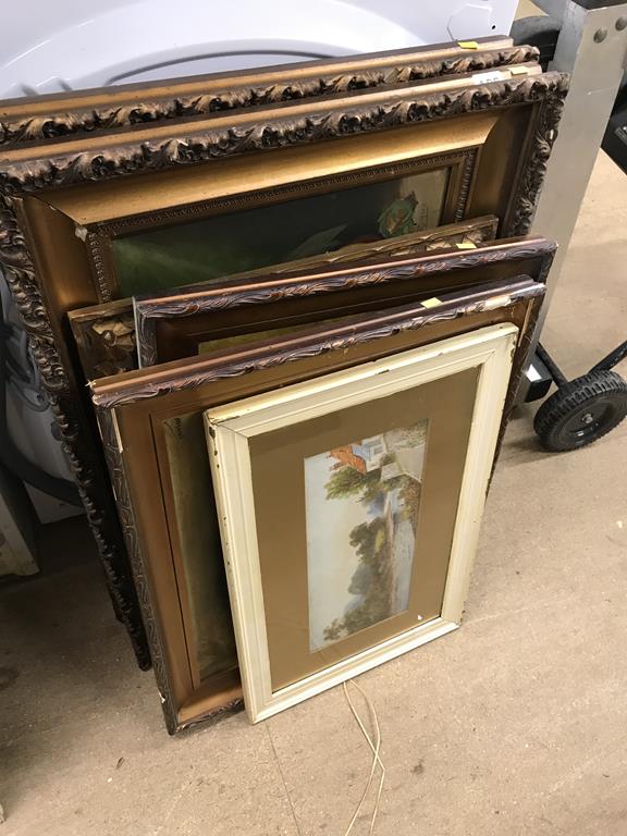 A quantity of framed pictures