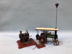 A Mamod traction engine, stationary engine and wheel