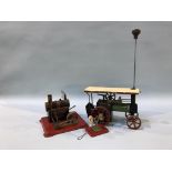 A Mamod traction engine, stationary engine and wheel