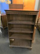 A reproduction mahogany open bookcase, 76cm width
