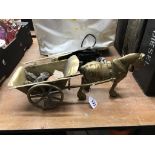 A brass horse and cart