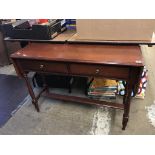 A reproduction mahogany side table