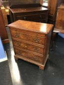 A reproduction Burr walnut chest of drawers, 62cm width