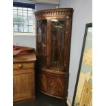 A good quality reproduction corner cabinet