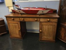 A mahogany twin pedestal sideboard