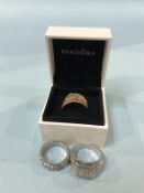 A Pandora ring and two costume rings