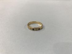 A gold coloured ring, 3.5g