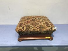 A mahogany footstool