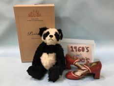 A boxed Steiff Panda bear and a pair of Meteor shoes