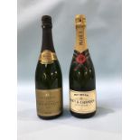 A bottle of Moet champagne and a bottle of Fortnum Mason 1983 champagne (2)