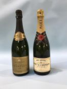 A bottle of Moet champagne and a bottle of Fortnum Mason 1983 champagne (2)