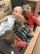 Various dolls and teddy bears