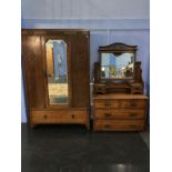 An oak wardrobe and a dressing chest